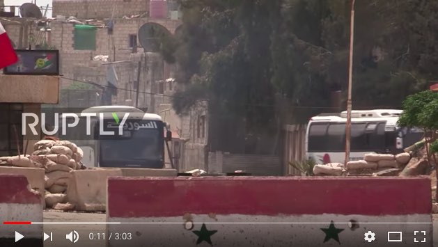 Rebels fleeing Douma by bus caravan under a Russian-negotiated 'safe passage' agreement